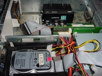 What makes an old server: an 8 gigabyte Hard Drive; 32 Megabytes of RAM; A Genuine Intel Pentium II (Clocked at 266MHz); a 100Mbs Network card; and a new Power Supply!